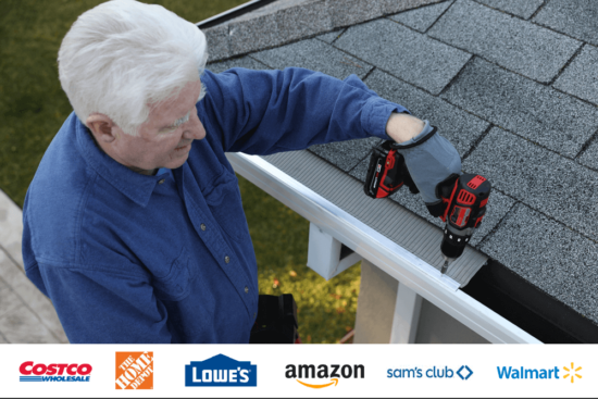 An older man uses a power drill to install a gutter guard on a house roof. Below the image are logos of Costco, Home Depot, Lowes, Amazon, Sams Club, and Walmart on a white background.